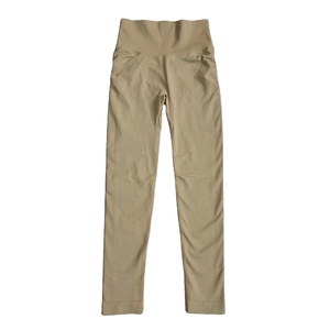 Venta al por mayor personalizado de cintura alta deportes entrenamiento Yoga pantalones leggings para mujeres poliéster suave gimnasio fitness leggings con bolsillo - Product Image 1