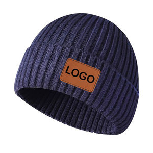 Gorros de Invierno de Punto Acrílico Lisos Unisex al por Mayor con MOQ Bajo, Etiqueta Tejida Personalizada, Parche de Cuero de Goma, Gorro de Punto Acanalado - Product Image 1