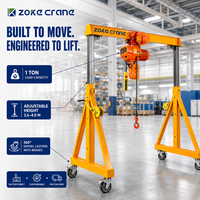 Grue portique mobile réglable de 0,5 tonne à commande manuelle pour la manutention de matériaux en atelier – Vente directe usine