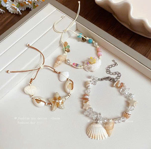 Bracelet en coquillages fait main du Vietnam, bijoux tendance, accessoire de plage naturel - Product Image 1