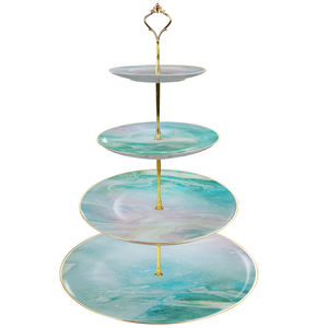 Набор посуды с кружащимися оттенками бирюзового и мягкого синего цвета с подставкой для торта из костяного фарфора, банкой для молока, кружкой 400 мл, блюдцем для чашек, тарелками - Product Image 5