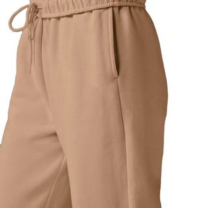 กางเกงวอร์มผู้หญิงพรีเมียมเนื้อผ้านุ่มสบาย ออกแบบมาเพื่อความสบายในชีวิตประจำวัน ทรงหลวมใส่สบายและดูมีสไตล์ เหมาะสำหรับการแต่งกายแนวสตรีท - Product Image 4