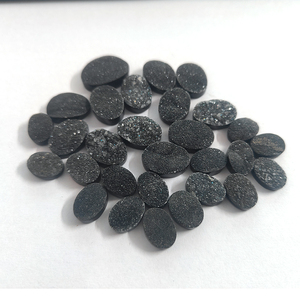 พลอยสีดำทรงหลังเบี้ยทรงรีขนาด14x10มม. ถึง22x16มม. จำนวน29ชิ้นมี248.8ชิ้นเรียงสูงเทียบกับพลอยหลวมเรา $199 - Product Image 1