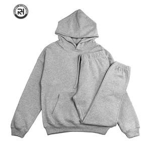 Vente en gros de survêtements de sport d'hiver solides à capuche avec logo personnalisé ensemble de jogging de gymnastique pour hommes et femmes respirant taille élastique - Product Image 1