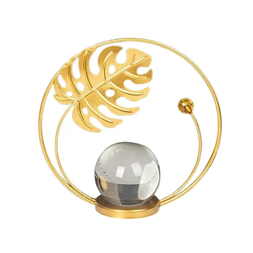 ゴールドメタルスタンド付きの持続可能な品質のクリスタルボール家の寝室のヴィラテーブルの装飾デスクの装飾のための豪華なクリスタルボール工芸品