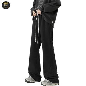 Pantalones acampanados informales de bajo precio para hombre, servicio OEM, diseño de logotipo personalizado, pantalones acampanados de algodón 100% - Product Image 1