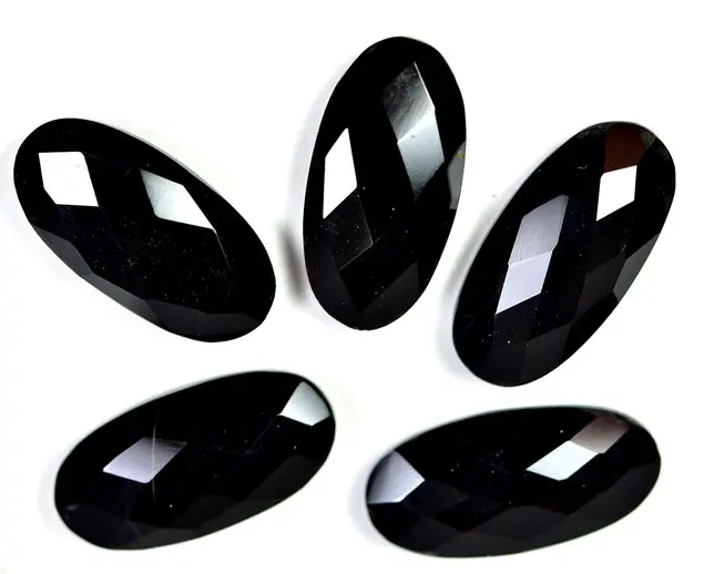 Yüksek kalite siyah oniks Faceted uzun Oval şekil Cabochons takı yapımı için çeşitli boyut için çarpıcı tasarım ile 925 gümüş