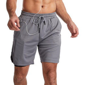 Fabricante de diseño de tendencia superior Logotipo personalizado Entrenamiento para hombre 100% Pantalones cortos dobles de algodón Ropa de gimnasio Pantalones cortos de doble capa - Product Image 5