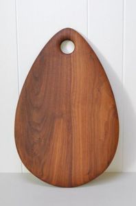 Stylish Acacia Wood Oval Chopping Board with Handle for Serving Cheese Meats and Vegetables in Modern Kitchens - Product Image 2