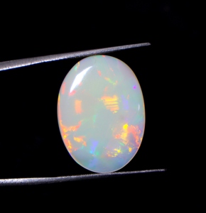 โอปอลธรรมชาติจากออสเตรเลีย 7 กะรัต รูปทรงวงรี โอปอลคูเบอร์เพดีแบบตัน  แบบเม็ดเดี่ยว - Product Image 1