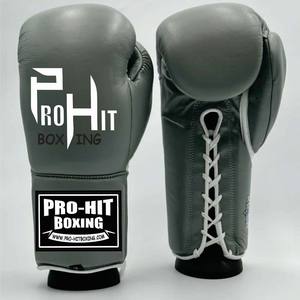 Guantes deportivos Unisex Ropa de entrenamiento Fabricación Cuero genuino Lucha profesional Logotipo personalizado Impreso Guantes de boxeo con cordones - Product Image 1