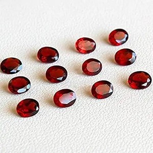 Pierres précieuses de grenat rouge du Mozambique naturelles de 5x4 mm, taille ovale, certifiées IGI, prix d'usine de création de bijoux, vente en gros en Inde - Product Image 1