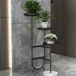 Chic Unique Shaped Metal Home Decor Stand de planta de pie en negro - Product Image 1
