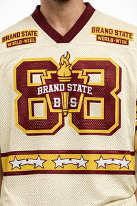 เสื้อฟุตบอลอเมริกันแบบใหม่มาแรง คุณภาพดีที่สุด ผลิตจากโพลีเอสเตอร์ 100% ชุดทีมสีพื้น แขนสั้น - Product Image 4