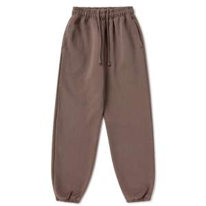 Pantalones deportivos básicos para hombre con cordón ajustable y bolsillos laterales, perfectos para correr, entrenar y relajarse - Product Image 1