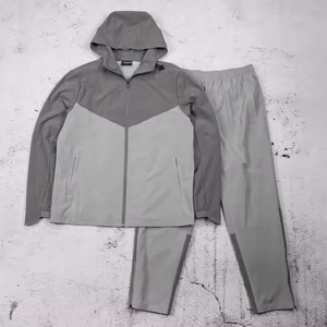 Chándales con cremallera para hombre de fabricante superior con logotipo de impresión personalizado OEM crea tu propio estilo chándales cortavientos de dos piezas de nailon - Product Image 1