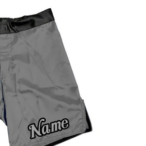 Pantalones Cortos de Satén Gris Personalizados para Hombre, Cintura Elástica, Logotipo Frontal, Nombre Personalizado Impreso en el Dobladillo Inferior, Tela Impermeable de Secado Rápido, Estilo MMA - Product Image 2