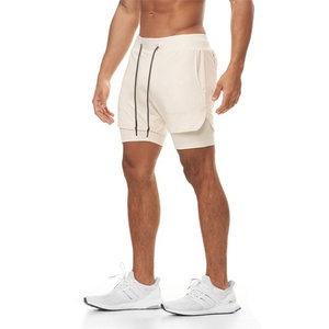 Short de gymnastique en Polyester uni à séchage rapide 2 en 1, Short d'entraînement avec poches - Product Image 5