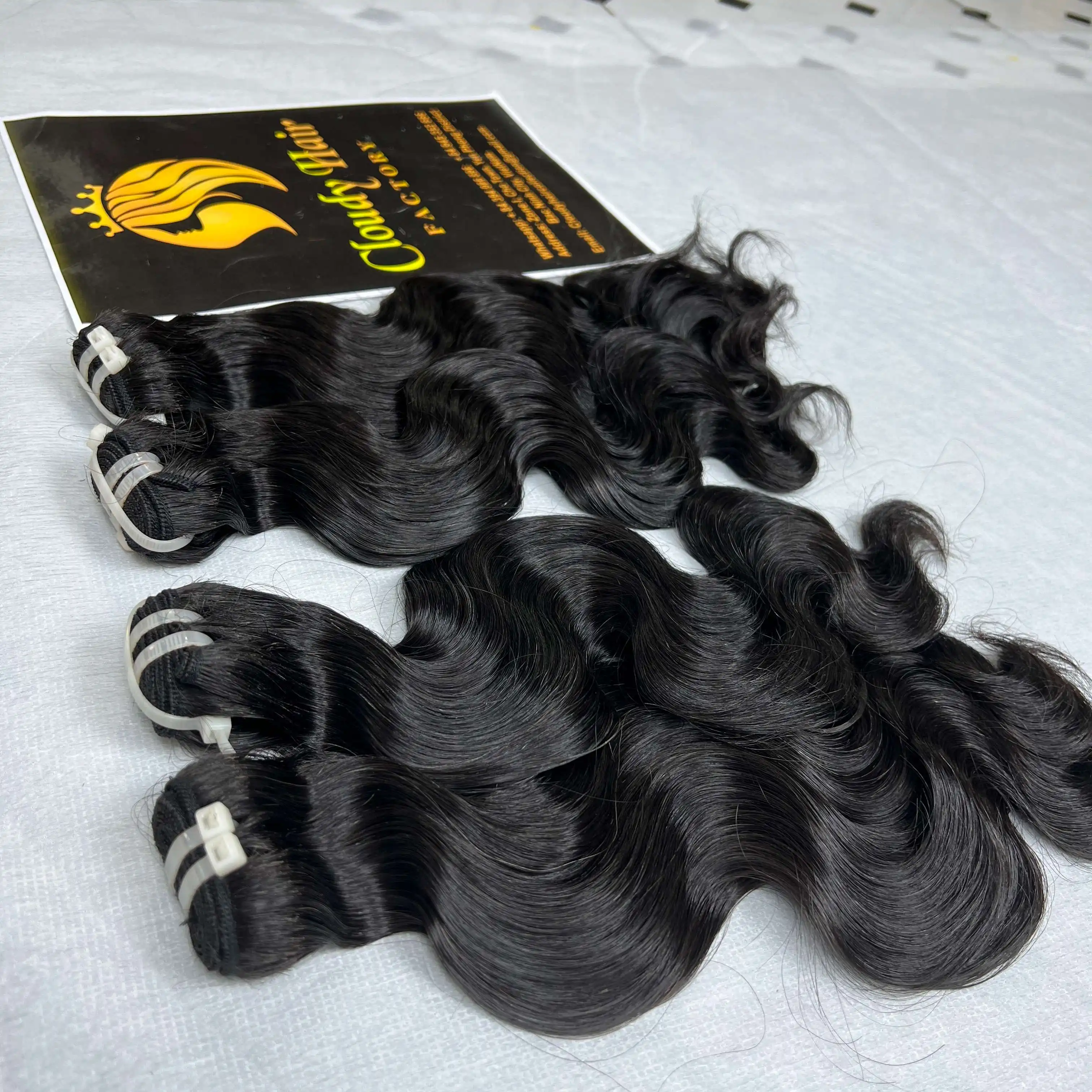 Cloudy Hair Company Venta al por mayor Paquetes de cabello virgen ondulado de cuerpo barato de Vietnam 100% Extensiones de cabello humano crudo