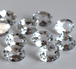 บุษราคัมสีขาวธรรมชาติทรงวงรีตัดขนาด7x9มม. เป็นรูปวงรีหลวมสีขาวบุษราคัม - Product Image 3