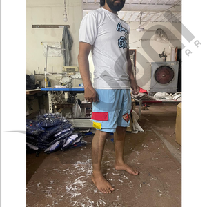 Ensemble de vêtements pour homme en deux pièces respirant 100% coton à manches courtes T-shirt et short de sport délavé à l'acide avec options personnalisables Séchage rapide - Product Image 3