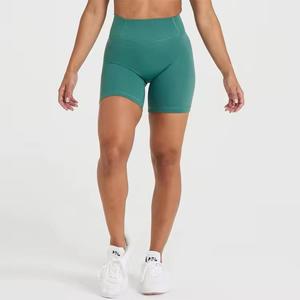 Venta al por mayor de las mujeres sin costuras de levantamiento de cadera entrenamiento Fitness Shorts estilo atlético de cintura alta de secado rápido pantalones cortos de yoga con bolsillos - Product Image 1