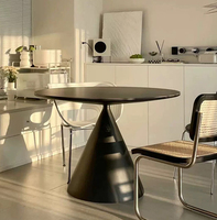 Table basse circulaire en panneau blanc mat de style italien simple et moderne, design minimaliste moderne