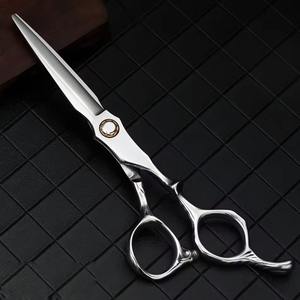 Este par de tijeras profesionales para peluquería incluye una tijera de corte recto y una tijera de entresacar diseñadas para peluqueros. - Product Image 2