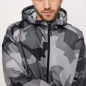 แจ็กเก็ตกันลมมีฮู้ดกันน้ำกันลมสำหรับผู้ชายน้ำหนักเบาสวมใส่ทุกวันคอตั้งทรงหลวมใส่ได้ด้านหน้า - Product Image 3