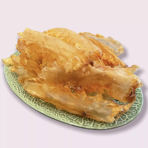 Tiras de tripas de pescado secas premium de la especie Pangasius, elaboradas para importadores globales que requieren un tamaño y un empaque consistentes y seguros. - Product Image 4