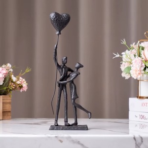 Las esculturas de pareja de metal más demandadas a menudo representan la unidad, el equilibrio y la armonía en las relaciones. - Product Image 4