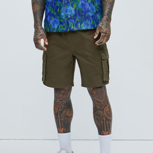 กางเกงขาสั้นผู้ชายทันสมัย แห้งเร็ว ผ้าฝ้าย 100% ไม่ถักทอ ลายเรียบ สำหรับฤดูร้อน ใส่ทำงาน เดินทาง ไปเที่ยวทะเล ใส่ได้ทุกวัน แบบถัก - Product Image 1