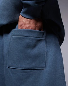 2025 artículo único logotipo impreso personalizado de talla grande para hombre Jogger color sólido de gran tamaño con bolsillos laterales ropa de calle Hombre corto - Product Image 6