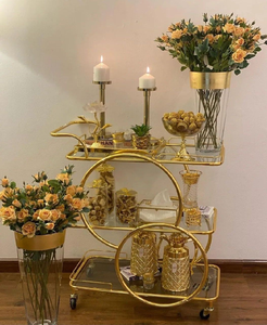 Chariot de bar doré élégant ajoutant classe et style à votre salon. Disponible aux prix de gros. - Product Image 2