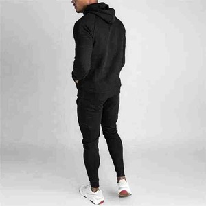 Conjunto de dos piezas con pantalones elásticos para hombre, conjunto de dos piezas con patrón sólido para correr en el gimnasio, venta al por mayor - Product Image 6