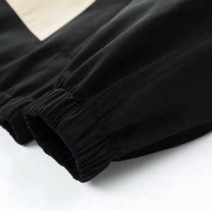 Ensemble de survêtement décontracté d'hiver unisexe personnalisé OEM, deux pièces, veste coupe-vent en nylon, logo uni, doublure en coton, survêtement - Product Image 5