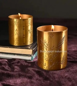 Tarro de vela de Metal de tendencia 2025 en acabado dorado para decoración de iluminación de fiesta de eventos en casa tarro de vela de hierro de forma redonda - Product Image 1