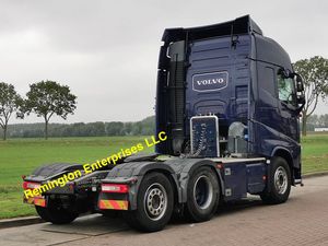 Camion tracteur Volvo FH 500 6x2 2015 avec cabine à toit haut, calandre chromée bleu foncé et phares LED - Product Image 3