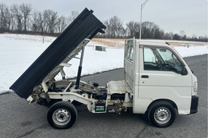 USADO ASEQUIBLE Y LISTO PARA CONDUCIR |   CONDUCCIÓN IZQUIERDA |   Volante a la derecha |   1999 DAIHATSU HIJET DUMP TRUCK 4WD 5 VELOCIDADES - Product Image 2