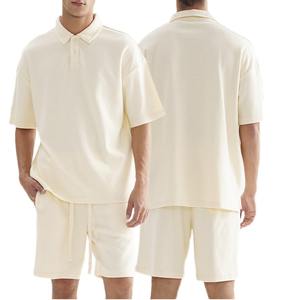 Ensemble 2 pièces tendance pour hommes polo d'été respirant et décontracté de haute qualité et short style gaufré design ample et lourd - Product Image 1