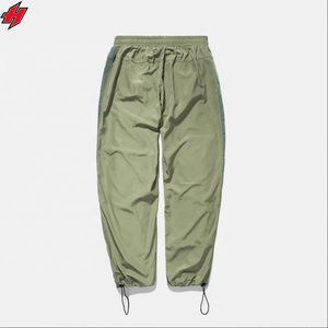 Pantalones de chándal de nailon personalizados 100% poliéster pantalones de nailon de pierna ancha logotipo bordado 3D pantalones de chándal de nailon holgados para hombres - Product Image 6