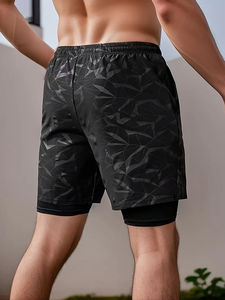 Shorts de gym pour hommes à séchage rapide pas cher en vente en gros de shorts d'entraînement de fitness en maille de plage avec poches taille imprimée en polyester uni - Product Image 4
