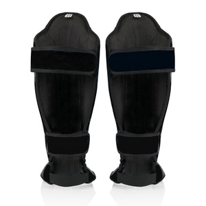Protections de tibias durables pour Muay Thai et MMA – Protège-tibias en cuir synthétique et mousse haute densité pour le sparring et le combat de kickboxing - Product Image 3
