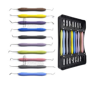 Juego de instrumentos de llenado compuesto Dental de gran venta, 10 Uds., mango de silicona de doble extremo, fuente de alimentación Manual hecha de acero - Product Image 1