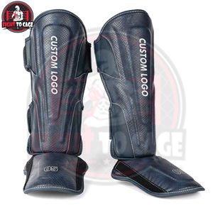 Protections de tibia de qualité supérieure MMA Muay Thai Boxe Protections de tibia et de cou-de-pied robustes en cuir avec boucle à crochets Absorption des chocs Équipement de protection - Product Image 2