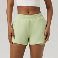 Short athlétique pour femme Short de course taille haute Pocket Sporty Short d'entraînement élastique