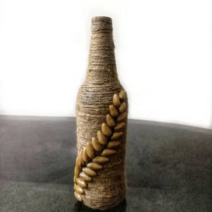 Nouvelle bouteille de vin de jute Standard de qualité supérieure élégante pour l'utilisation de décor d'hôtel à la maison en vente en gros bouteille de jute bon marché - Product Image 1
