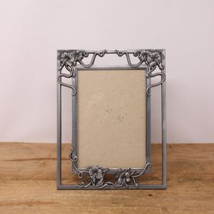 Contemporary luxury metal <b>photo</b> <b>frame</b> perfect for modern interiors highlighting personal moments creatively - Product Image 2