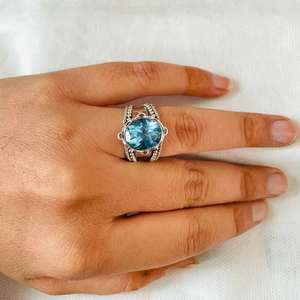 แหวนสัญลักษณ์บุษราคัมสีฟ้าของสวิสแบบพรีเมี่ยมสำหรับผู้หญิงเงินสเตอร์ลิงออกซิไดซ์ทรงรีตัดเป็นของขวัญแบบโบฮีเมียน - Product Image 6