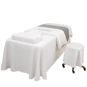 High-end Letter embossing 100% cotton massage bedspread set customized Beauty salon Spa 4pcs massage table cover set
